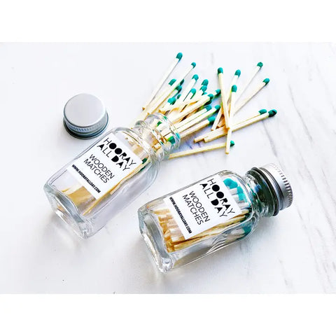 Colorful Wooden Matches in Little Glass Bottle