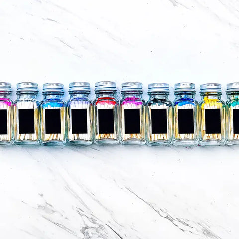 Colorful Wooden Matches in Little Glass Bottle