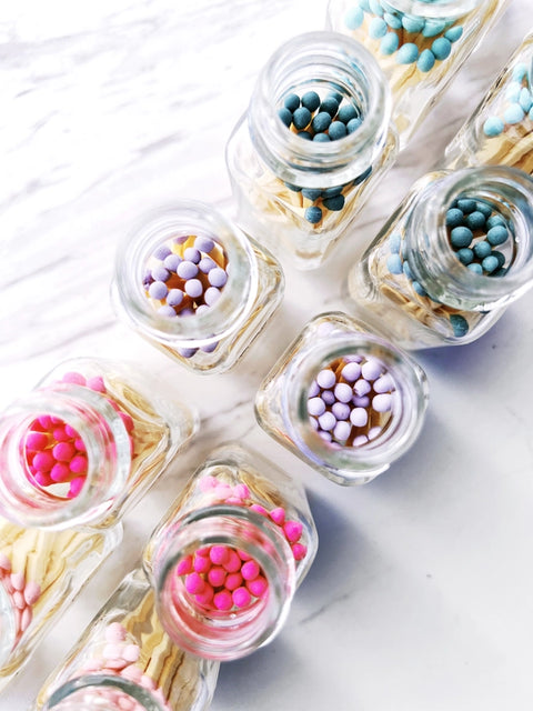 Colorful Wooden Matches in Little Glass Bottle